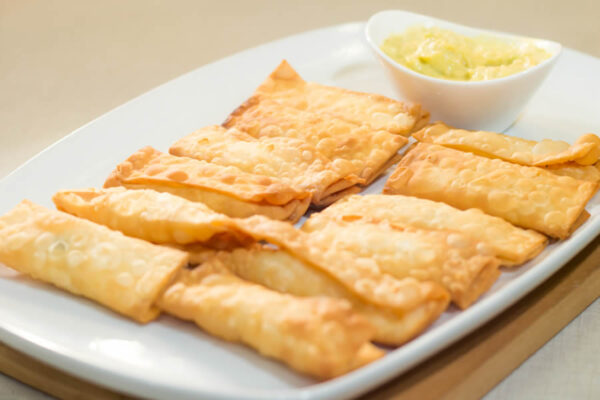 Indulge in Crunchy Cheese-Filled Pastry Sticks